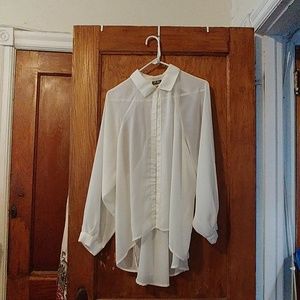 Sheer, open back blouse